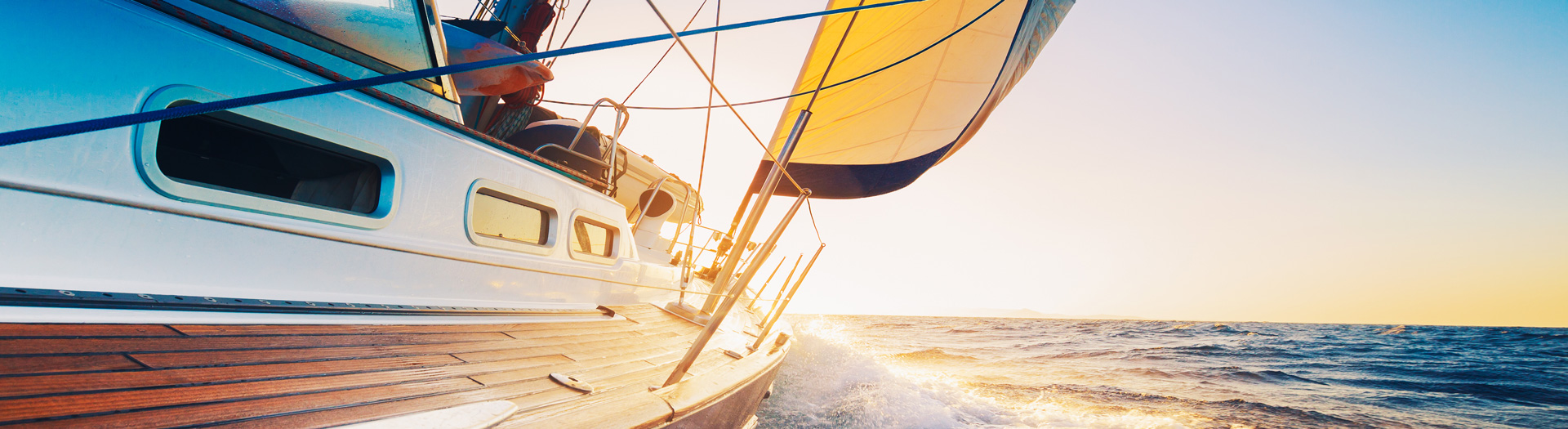 SLIDER sailing-sunset-11513310